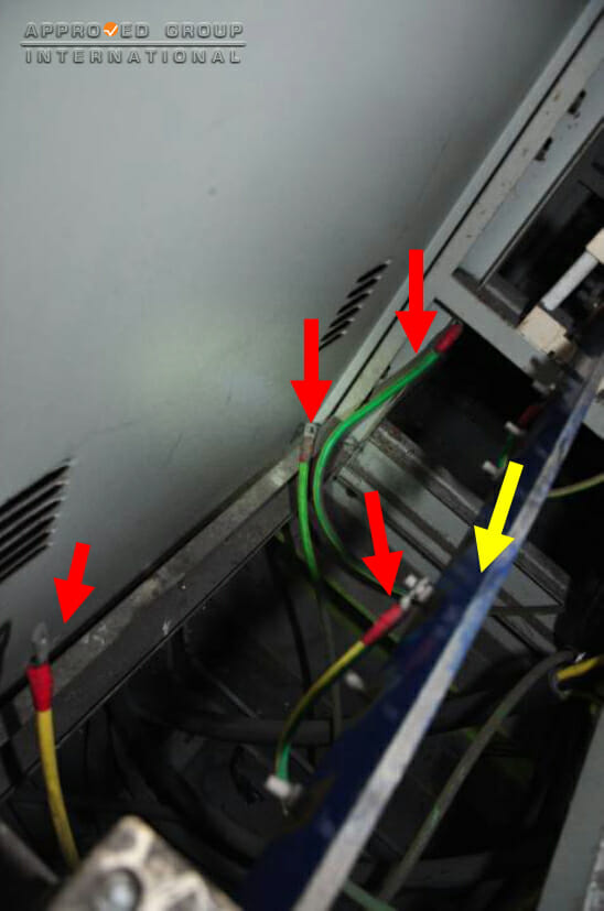 Figure 1: The neutral cables (red arrow) were found to be dismantled from the neutral bar (yellow arrow)
