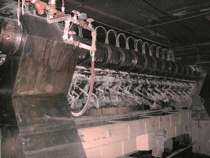 Contamination residue coating an industrial machine after water damage
